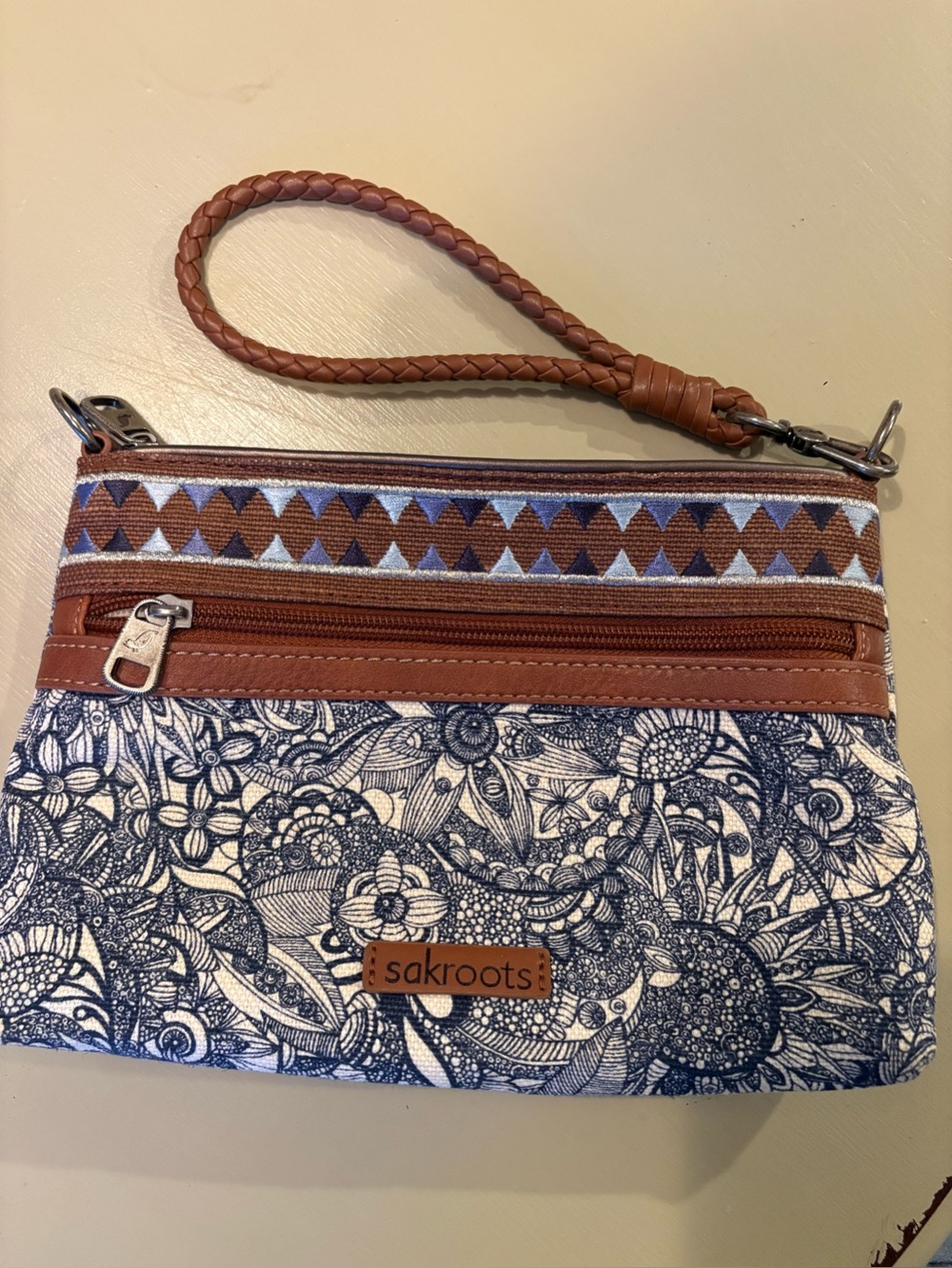 Sakroots Navy Floral Canvas Wristlet with Brown Trim